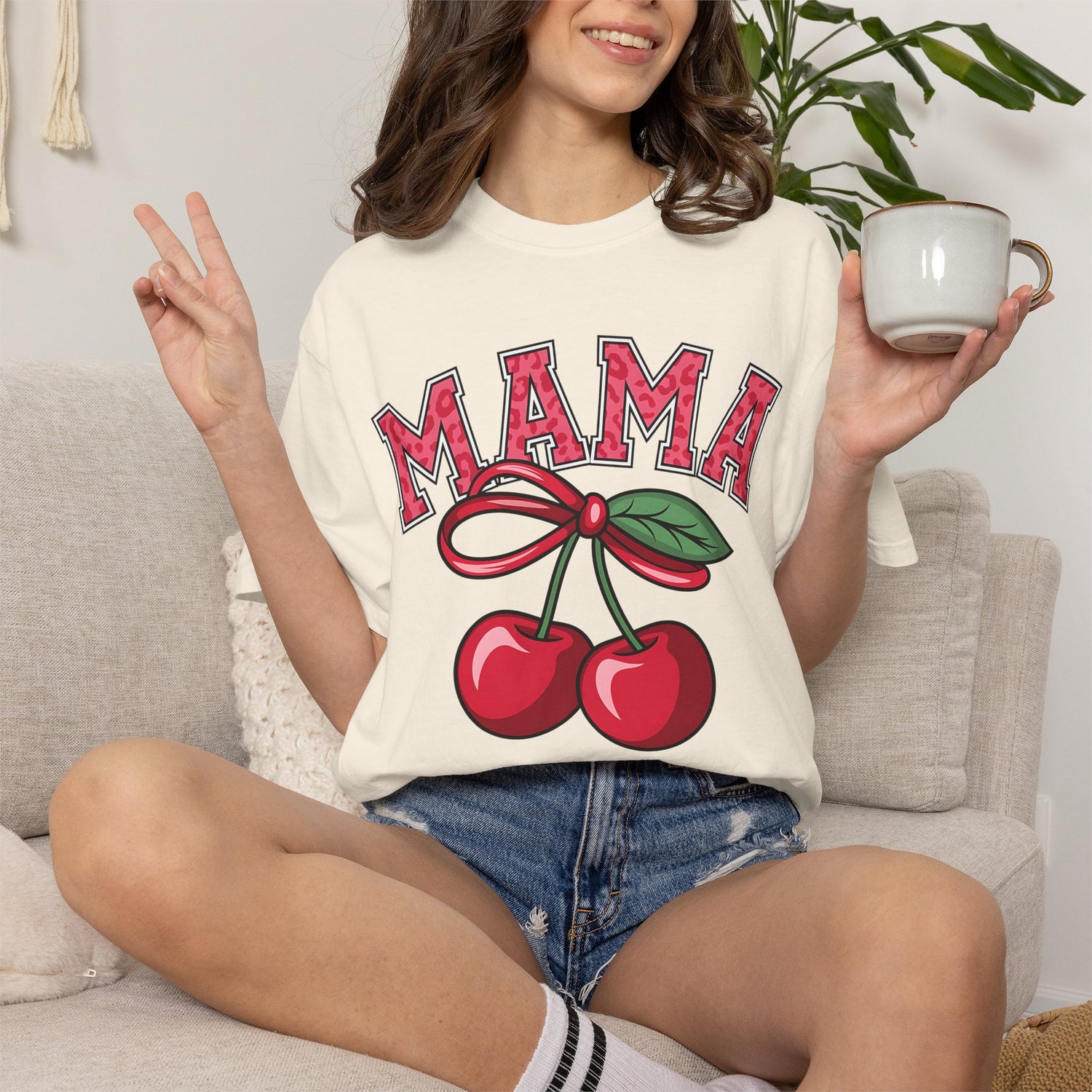 Pink mama Comfort Colors shirt with cherry graphic and coquette bow design